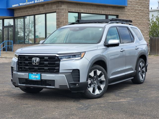 2026 Honda Pilot Touring in Solar Silver Metallic — front three-quarter view