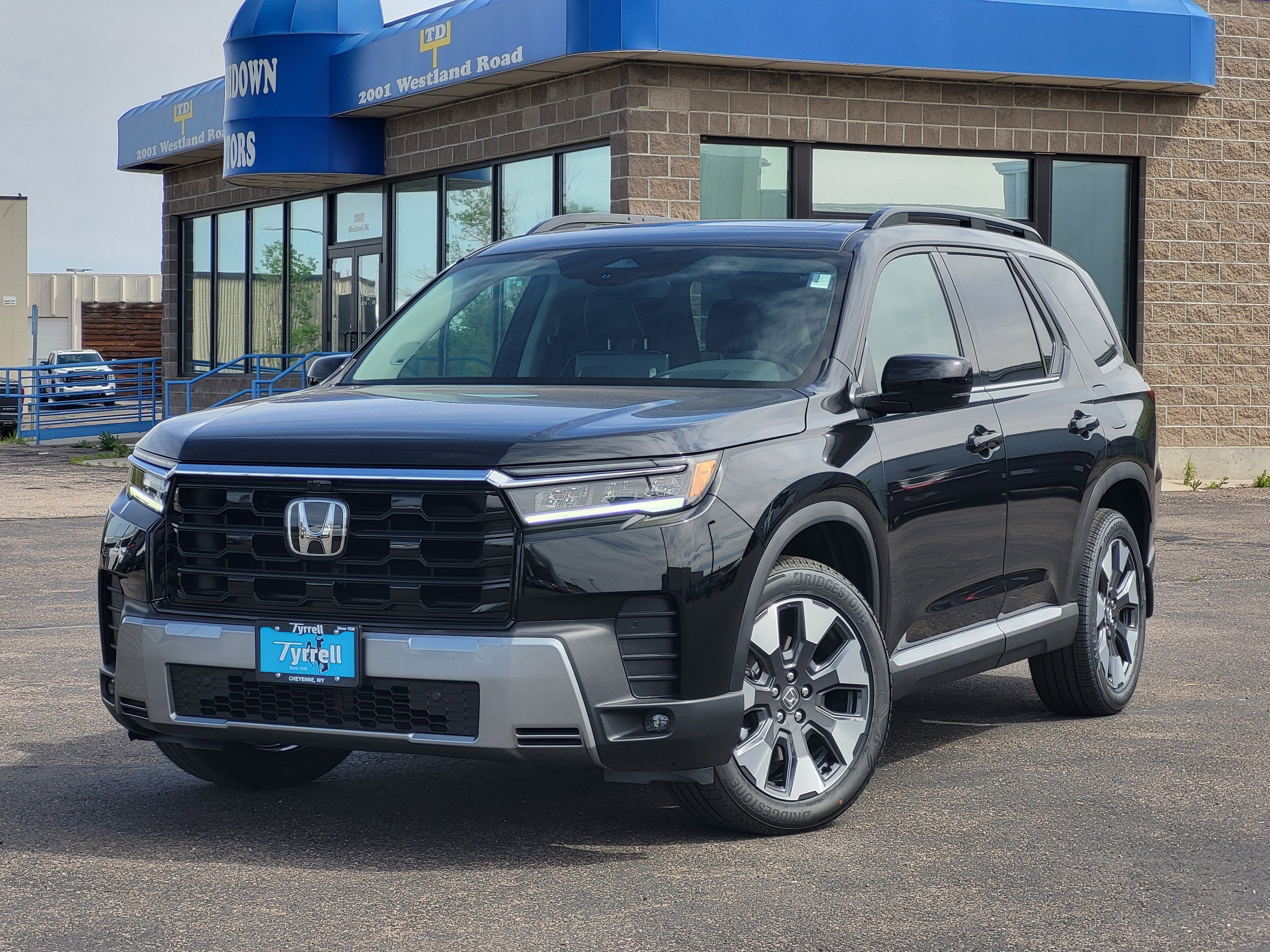 2026 Honda Pilot Elite in Crystal Black Pearl — front three-quarter view