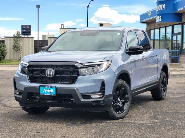 2026 Honda Ridgeline Black Edition in Sonic Gray Pearl — front three-quarter view
